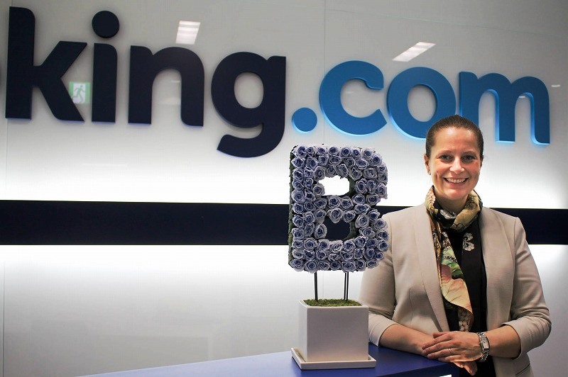 What is Booking.com’s strategy to increase lodging partners in Japan?